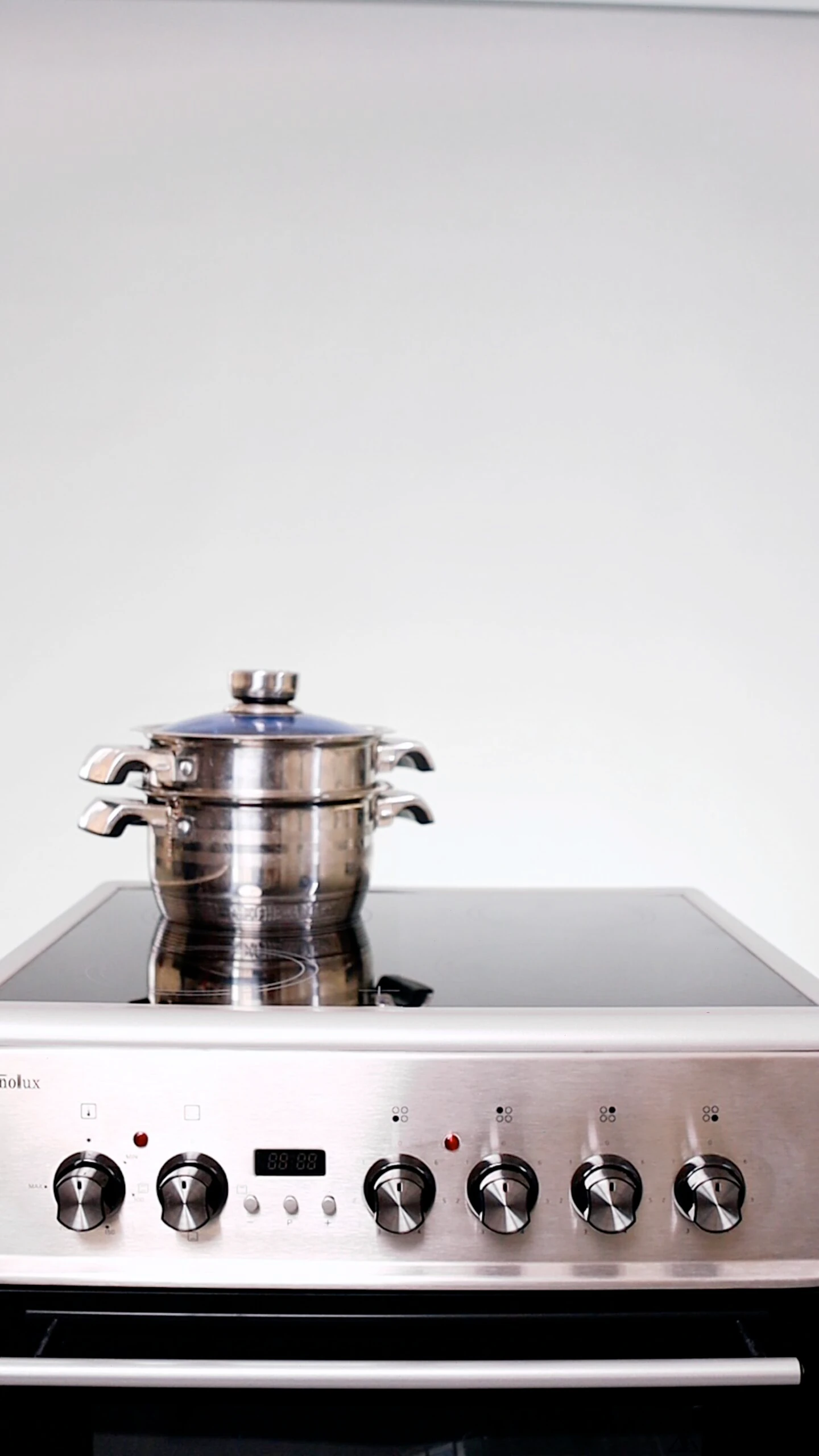 Cuisinière Technolux induction 4feux électrique 60X60 gris TCX66FSXVTC