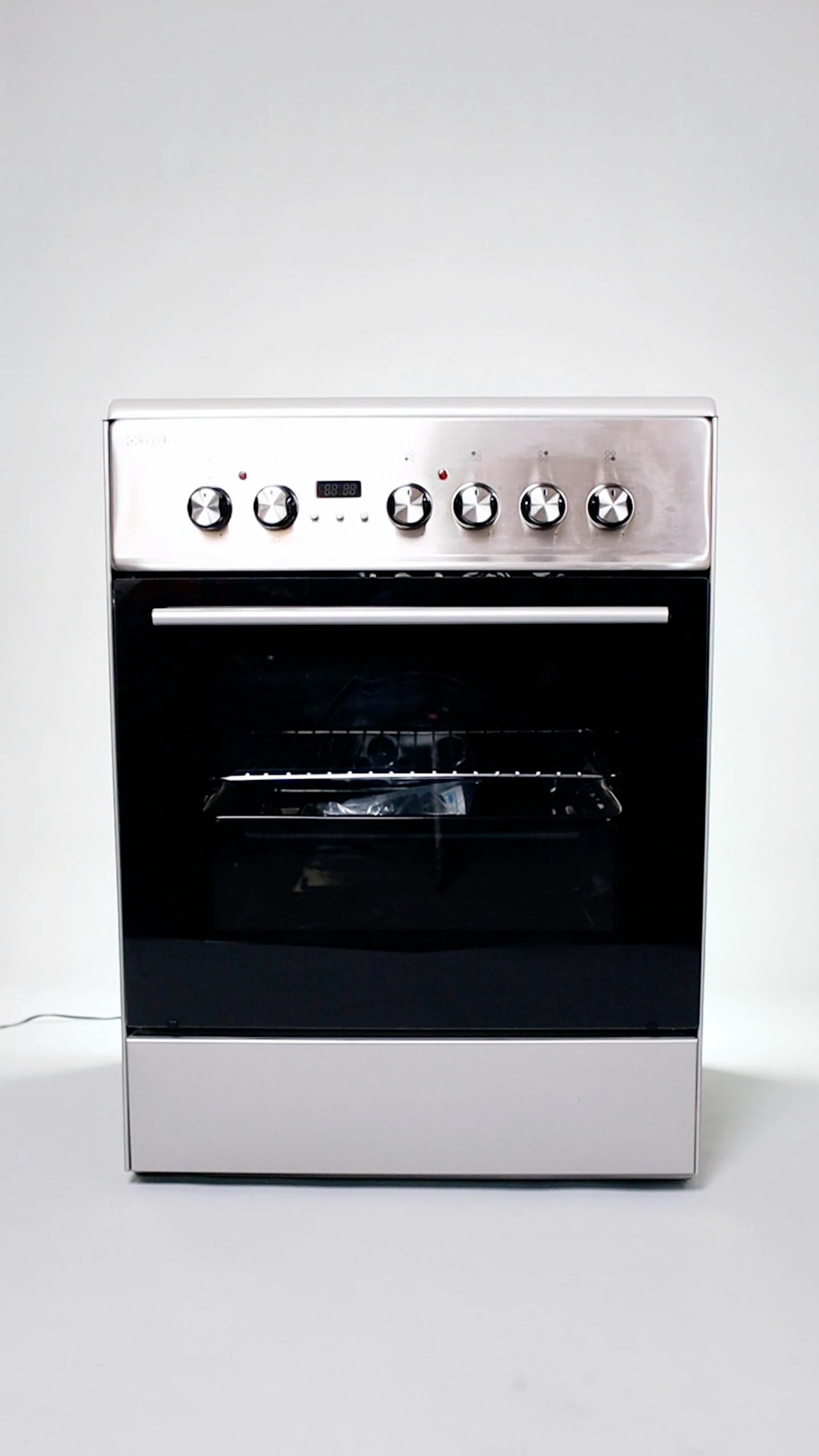 Cuisinière Technolux induction 4feux électrique 60X60 gris TCX66FSXVTC